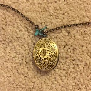 Gold and blue locket necklace